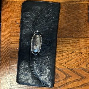 Seril black leather clutch